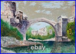 École Yugoslave Le vieux pont de Mostar Huile sur toile, signée. 41,5 x55,5 cm