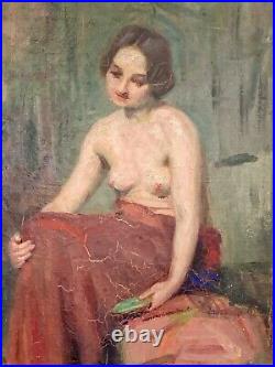 Élégante huile sur toile représentant une femme dévêtue, signée Augusta LAFITAU