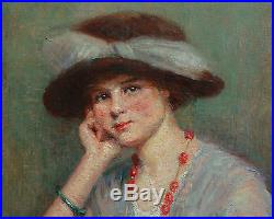 Portrait de femme huile sur toile Début XXème siècle Elégante au chapeau