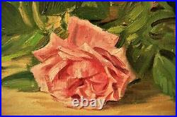 Roses sur entablement. Signé RIETER. Huile sur toile de 1927. Cadre 39 x 49 cm